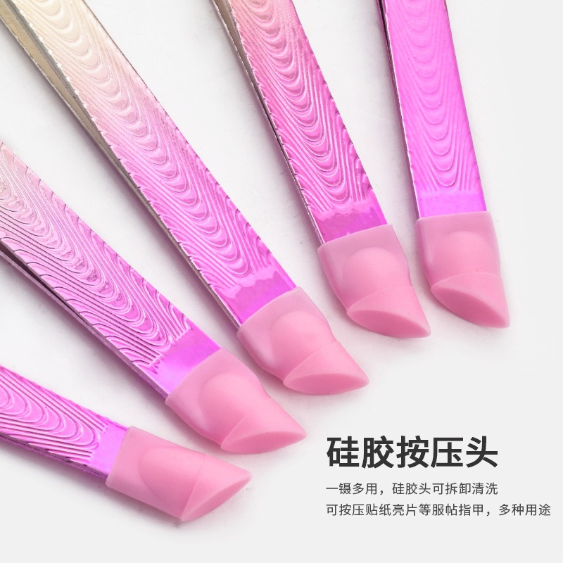 double headed tweezers with adhesive drill and silicone press rod to pick up nail stickers